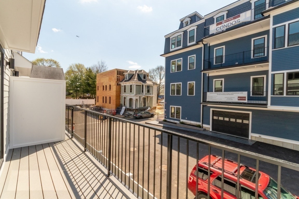 15 Tanglewood Road, Unit A Boston, MA 02126 - Photo 8 of 28 a view of balcony with furniture