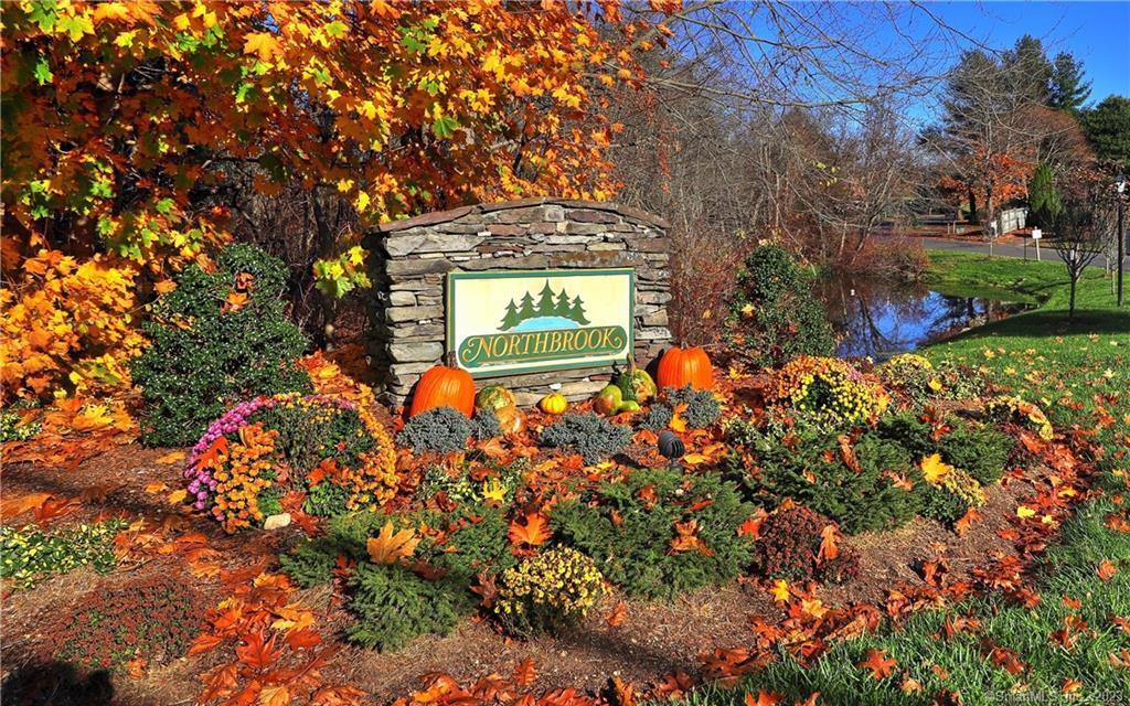 2 Cascade Circle, Unit 2 Monroe, CT 06468 - Photo 1 of 1 a sign that is on a tree