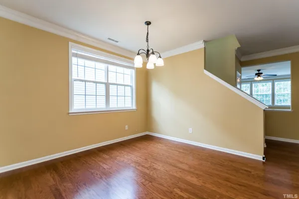 a view of a room with windows and fireplace