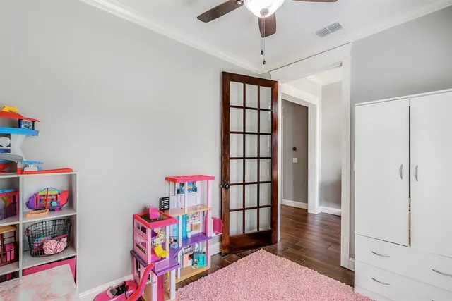 a room with a bed and a window