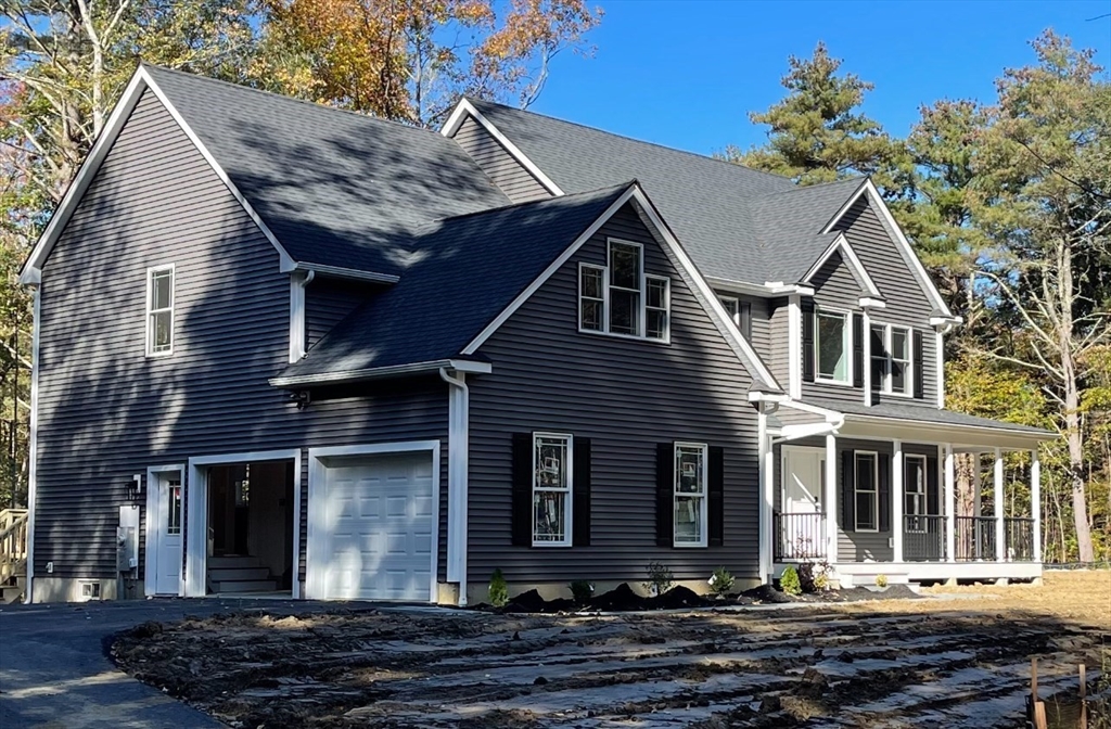 Lot 5 Northside Road Charlton, MA 01507 - Photo 2 of 11 a front view of a house