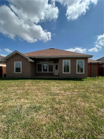 a view of a house with a garden