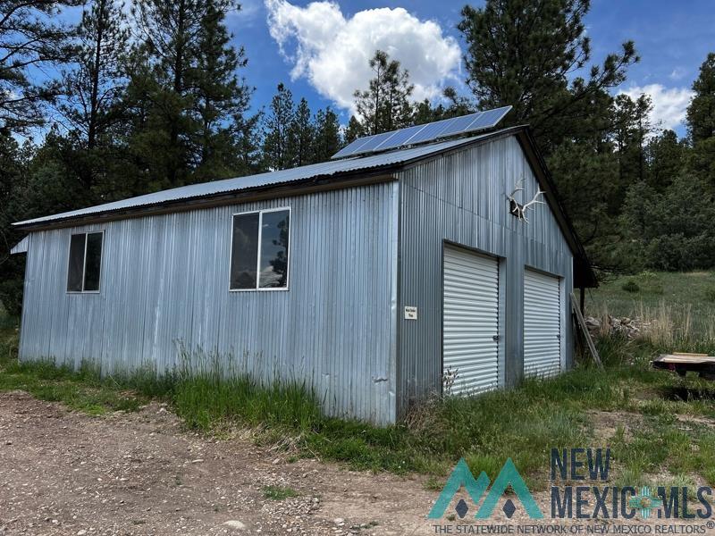 150 Forrest Service Road 124 Road Chamisal, NM 87521 - Photo 10 of 42 View of detached garage