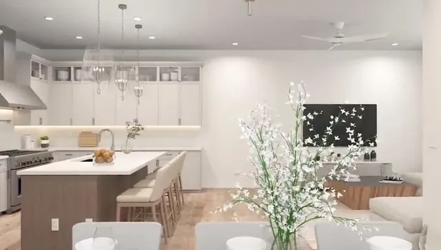 a dining room with furniture a chandelier and wooden floor