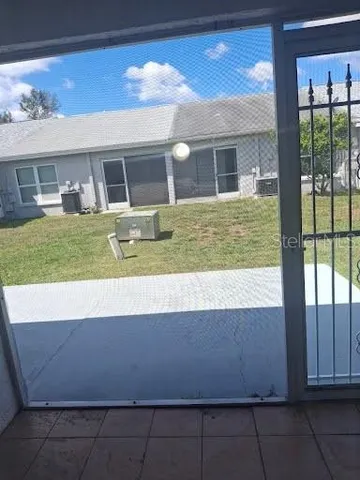 a view of house and front yard