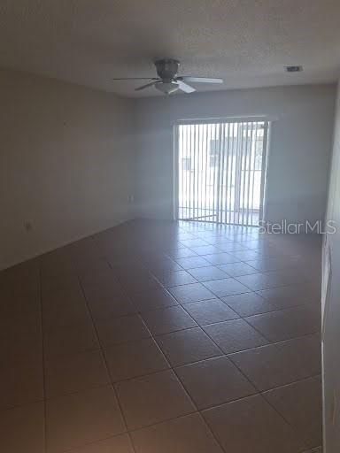 2933 Stillwell Court New Port Richey, FL 34655 - Photo 2 of 12 a view of an empty room with a window