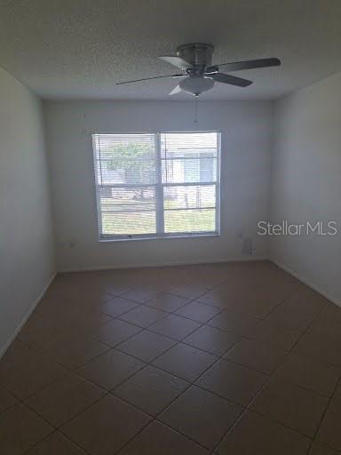 2933 Stillwell Court New Port Richey, FL 34655 - Photo 6 of 12 an empty room with a window