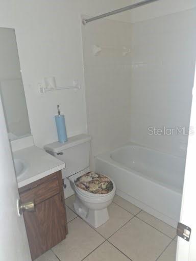 2933 Stillwell Court New Port Richey, FL 34655 - Photo 8 of 12 a bathroom with a sink a toilet and bathtub