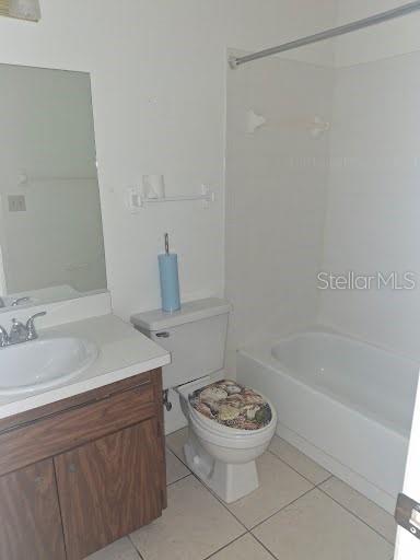 2933 Stillwell Court New Port Richey, FL 34655 - Photo 9 of 12 a bathroom with a sink a toilet and a bathtub