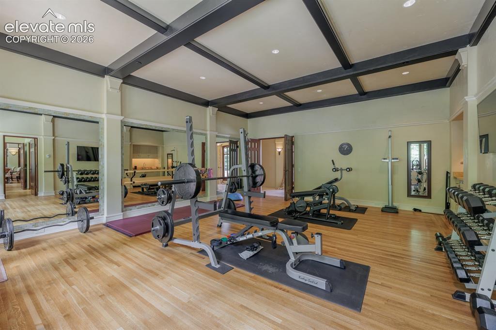 4530 Governors Point Colorado Springs, CO 80906 - Photo 26 of 49 Exercise room, walk out to terrace and up natural stone steps to out door in ground jacuzzi