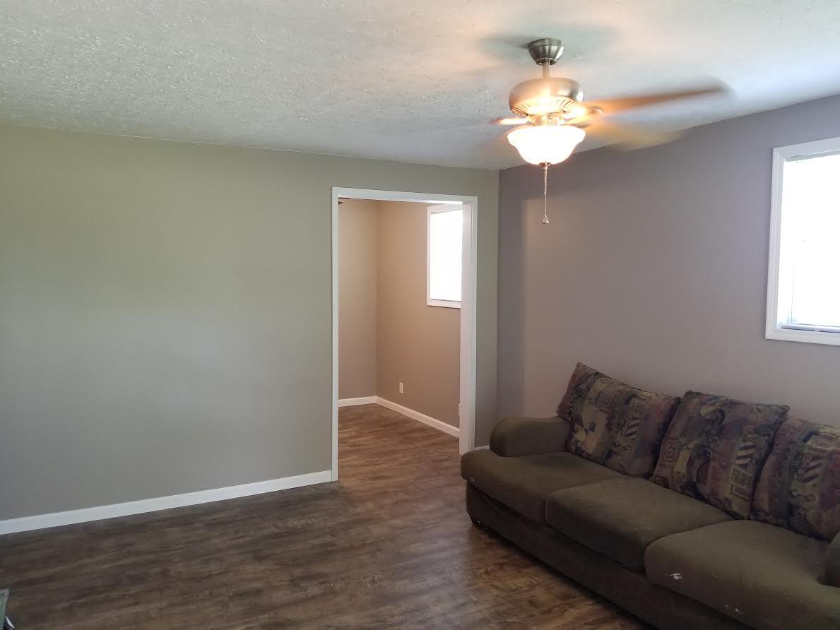 290 Tom Ferrell Road Portland, TN 37148 - Photo 6 of 14 a living room with a couch