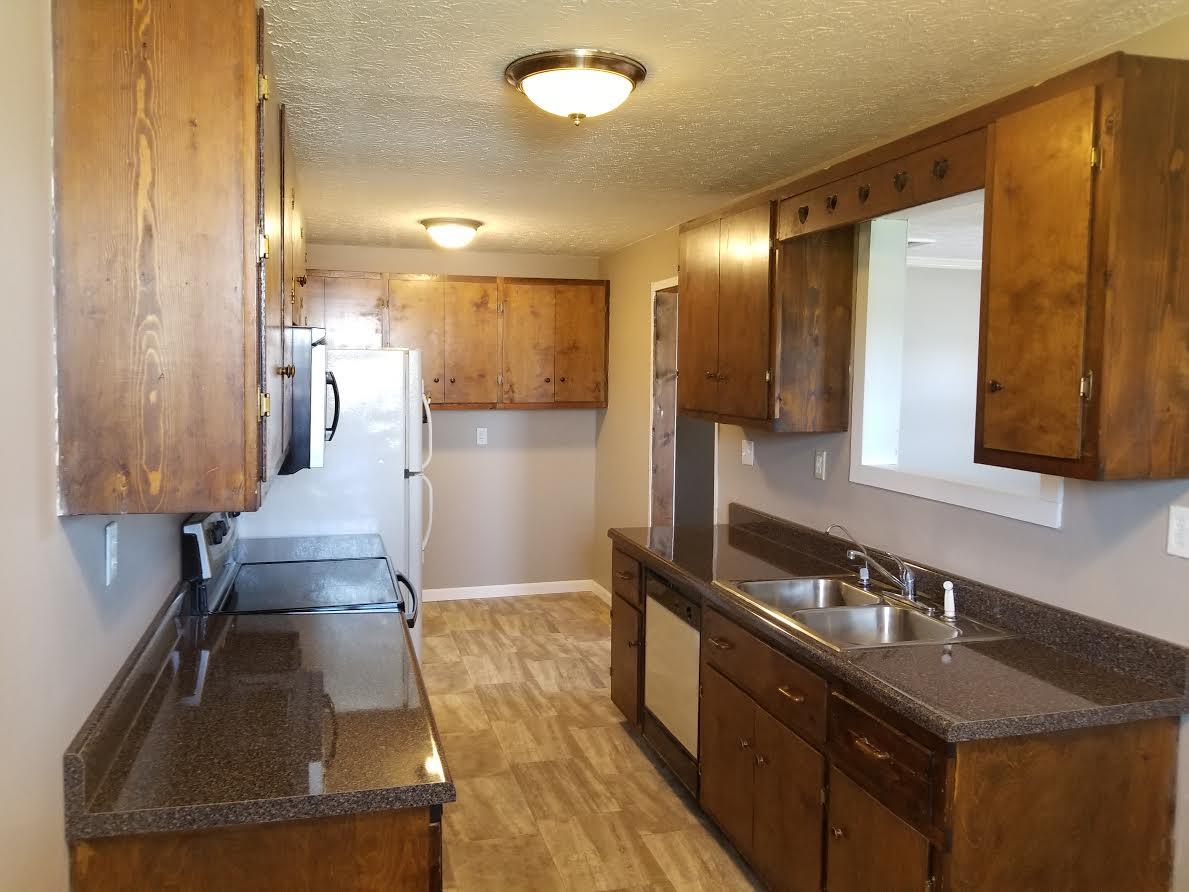 290 Tom Ferrell Road Portland, TN 37148 - Photo 8 of 14 a bathroom with a sink and a mirror