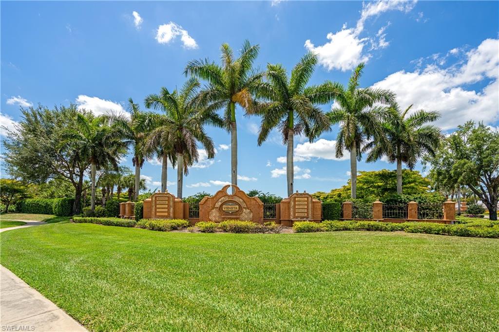 9259 Museo Circle, Unit 7102 Naples, FL 34114 - Photo 19 of 41 a view of a house with a garden