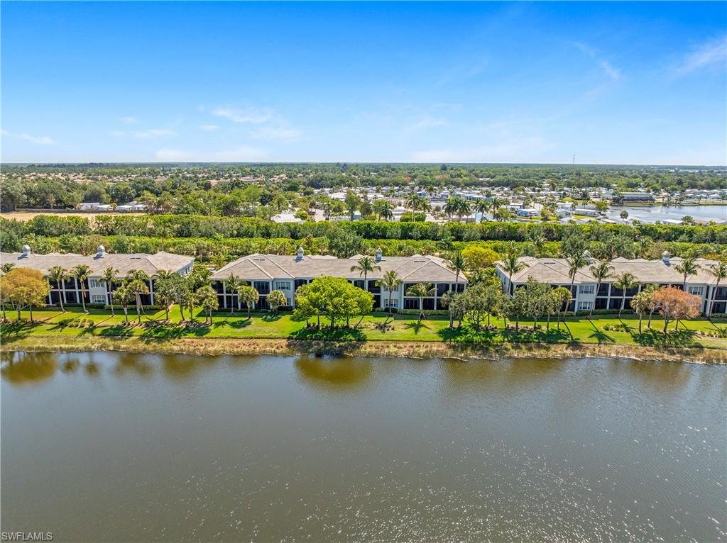 9259 Museo Circle, Unit 7102 Naples, FL 34114 - Photo 37 of 41 an aerial view of residential houses with outdoor space