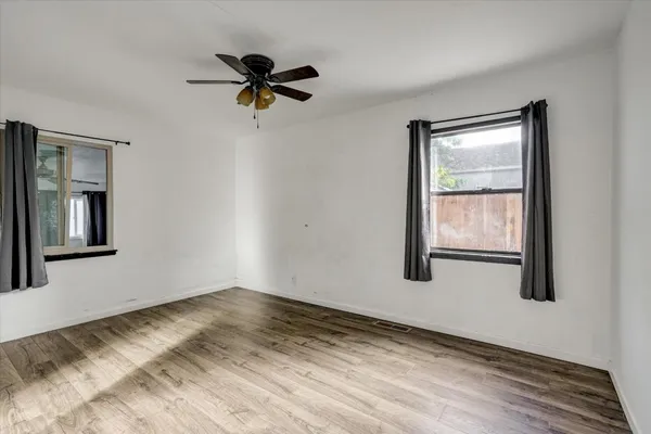 a view of a room that has a window in it