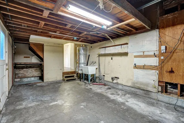 a view of garage with wooden floor