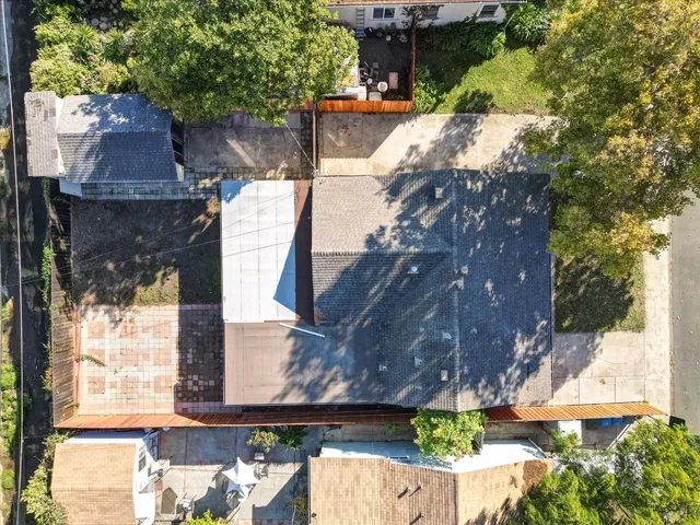 a view of a yard front of house