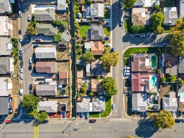 an aerial view of streets and trees