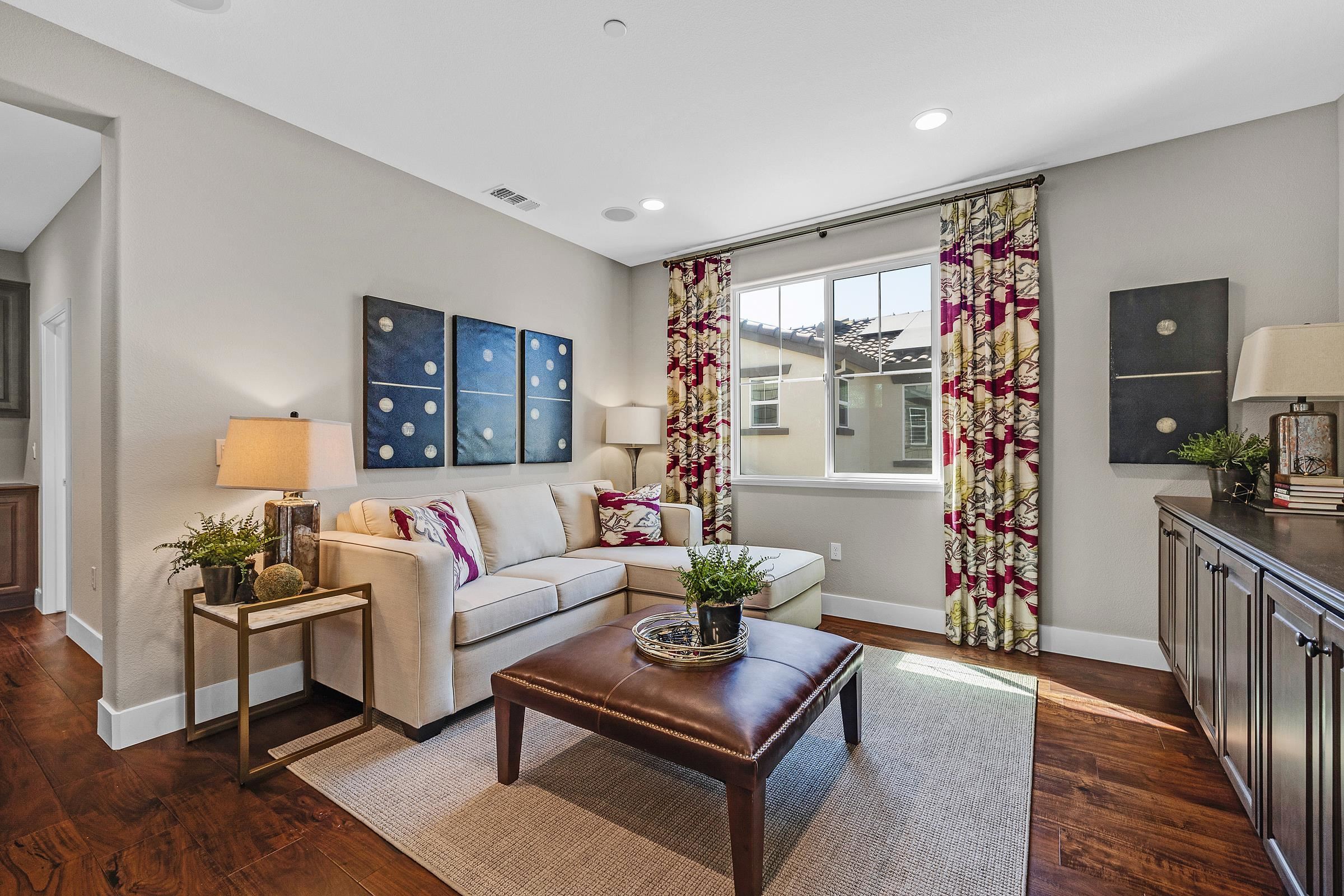 883 Barney Common Livermore, CA 94551 - Photo 19 of 38 a living room with furniture and a large window