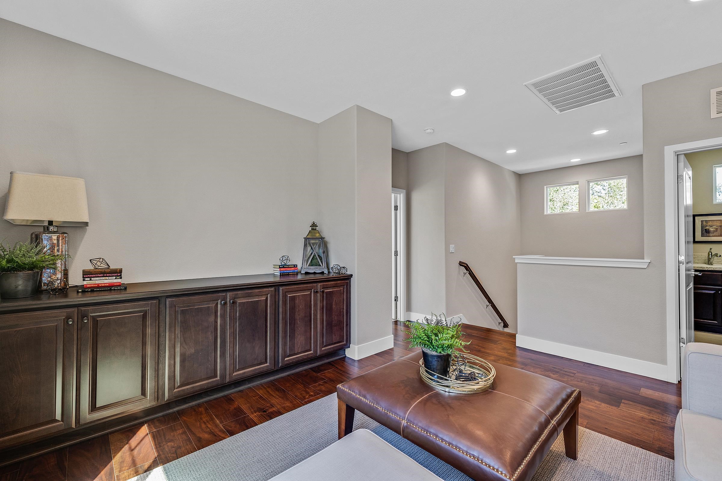 883 Barney Common Livermore, CA 94551 - Photo 20 of 38 a living room with furniture and a potted plant