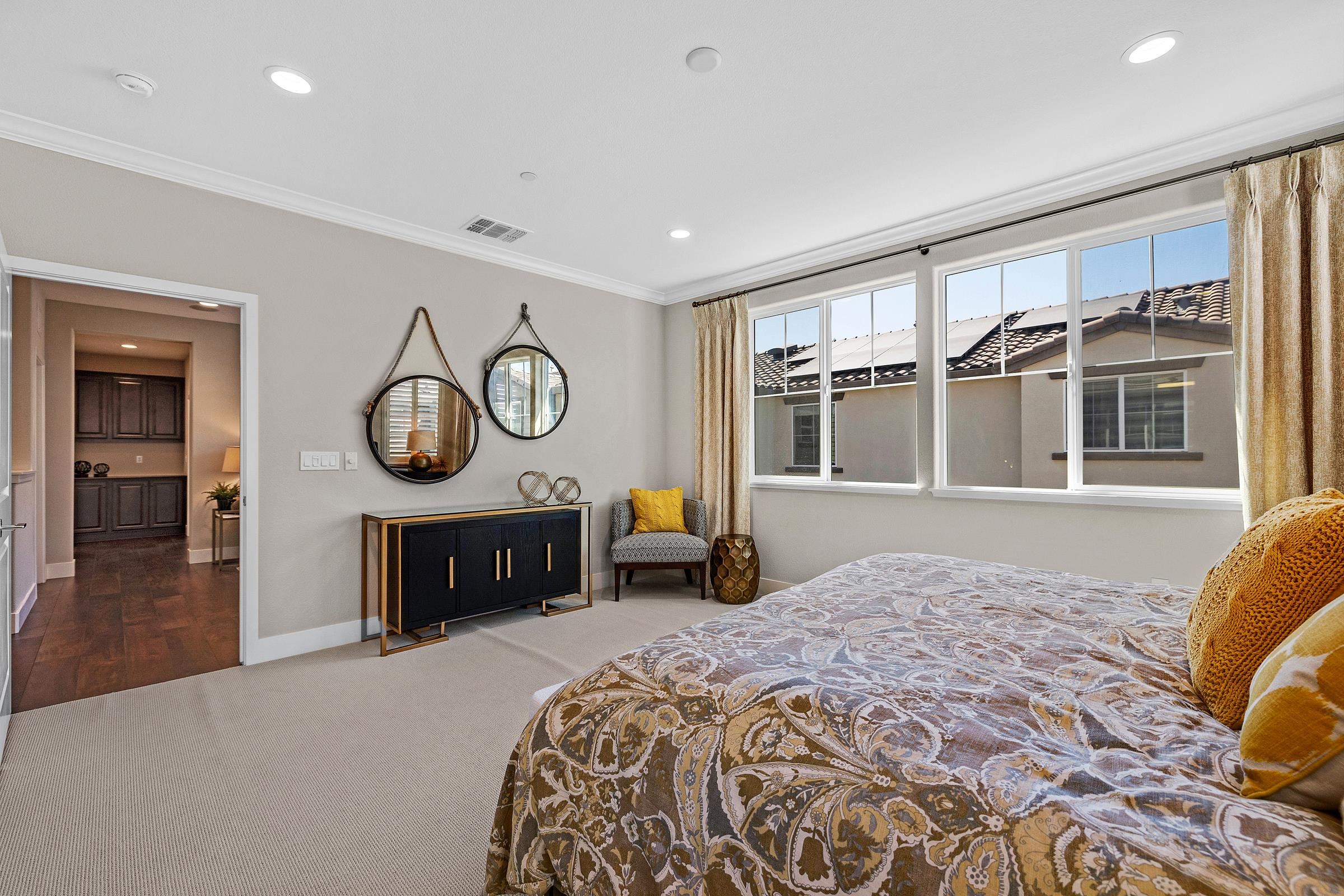 883 Barney Common Livermore, CA 94551 - Photo 24 of 38 a bedroom with furniture and a window