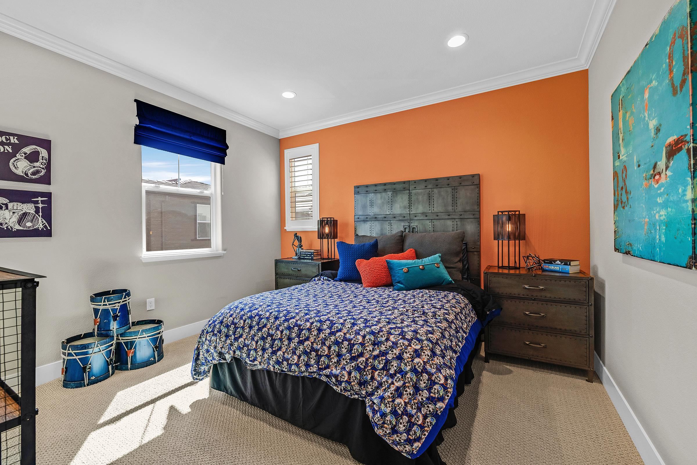 883 Barney Common Livermore, CA 94551 - Photo 29 of 38 a bedroom with a bed and a dresser in it