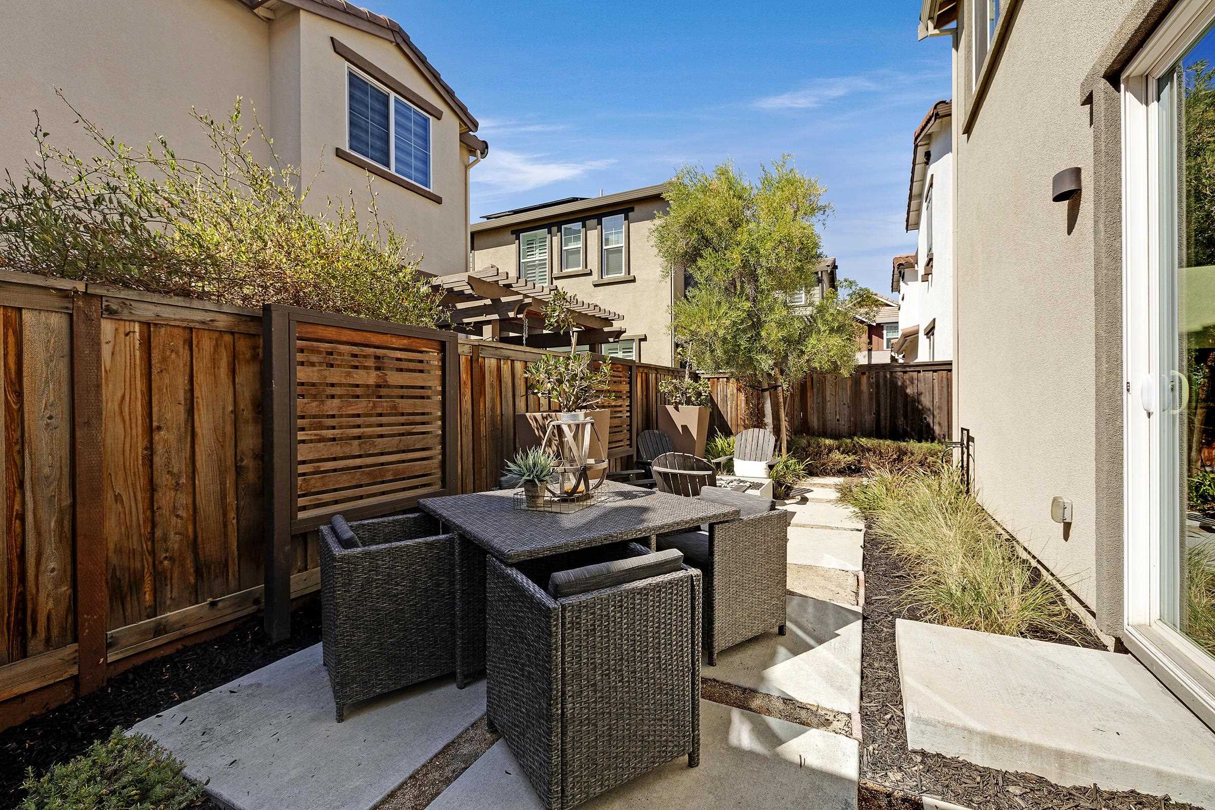 883 Barney Common Livermore, CA 94551 - Photo 34 of 38 a view of a house with backyard