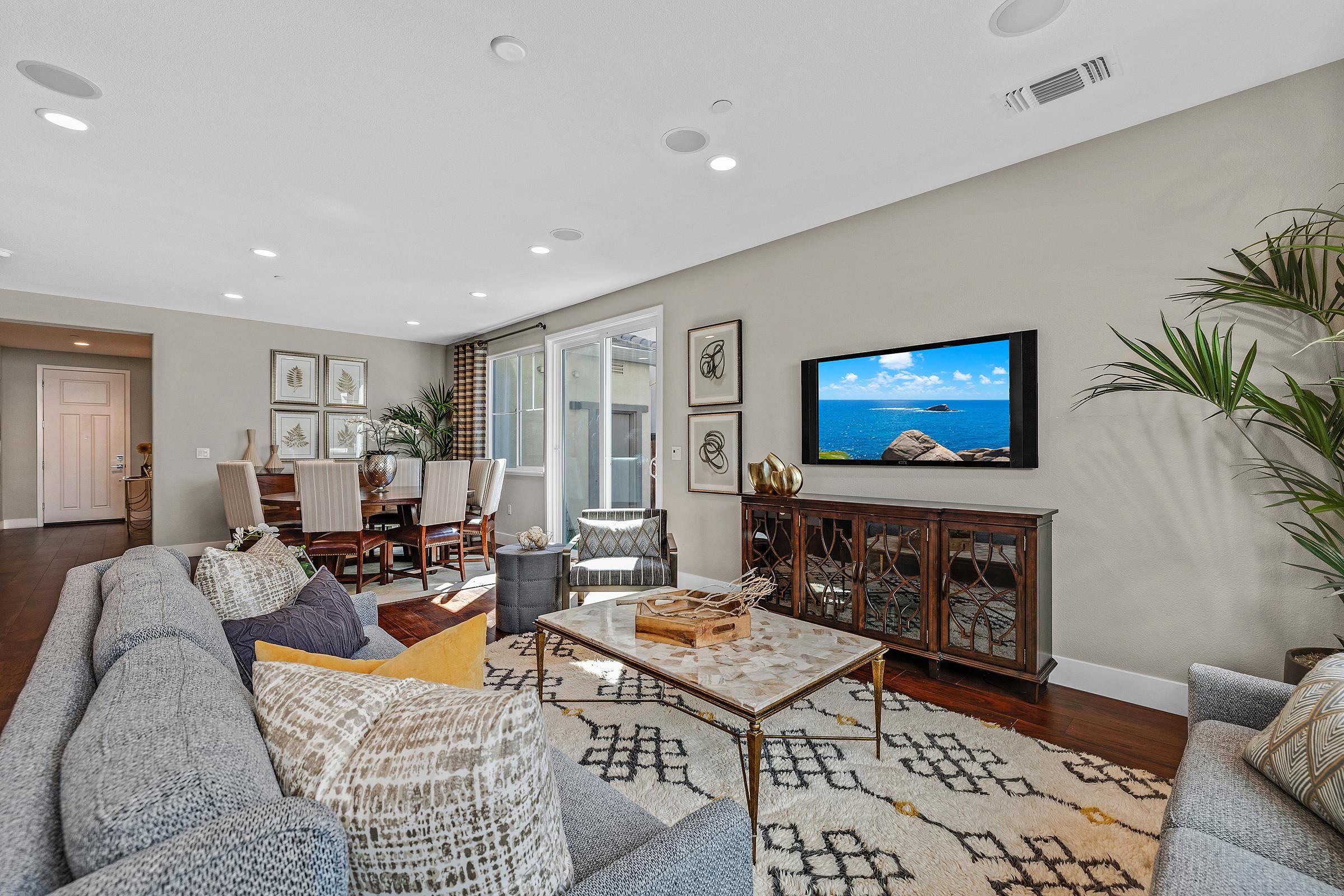 883 Barney Common Livermore, CA 94551 - Photo 10 of 38 a living room with furniture and a flat screen tv