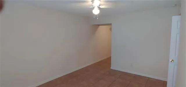 a view of a small space with a fan