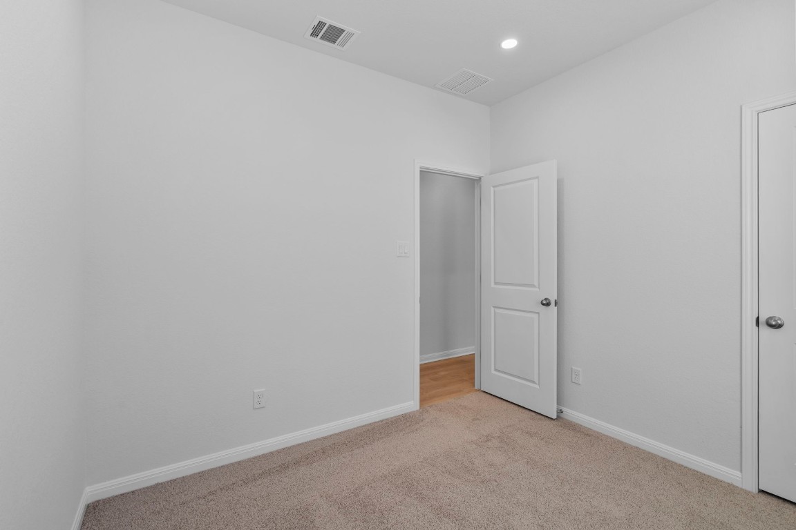 129 Hatari Trail Jarrell, TX 76537 - Photo 13 of 33 a view of an empty room