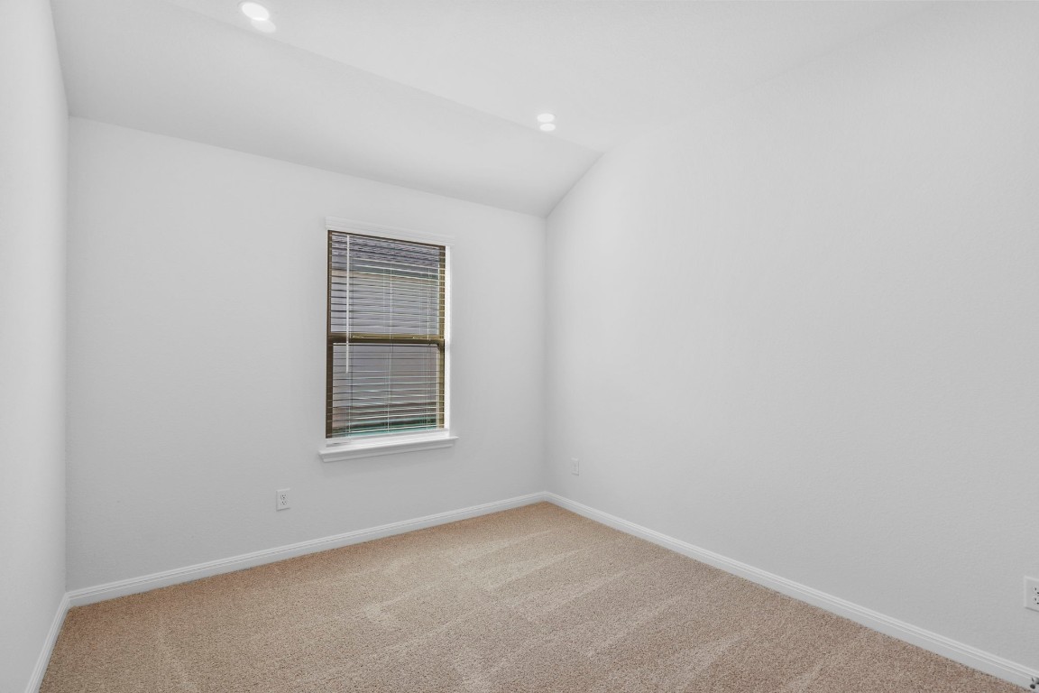 129 Hatari Trail Jarrell, TX 76537 - Photo 10 of 33 an empty room with a window