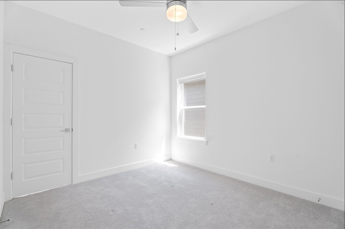 609 Terrier Trail Austin, TX 78745 - Photo 11 of 26 a view of a livingroom with an empty space