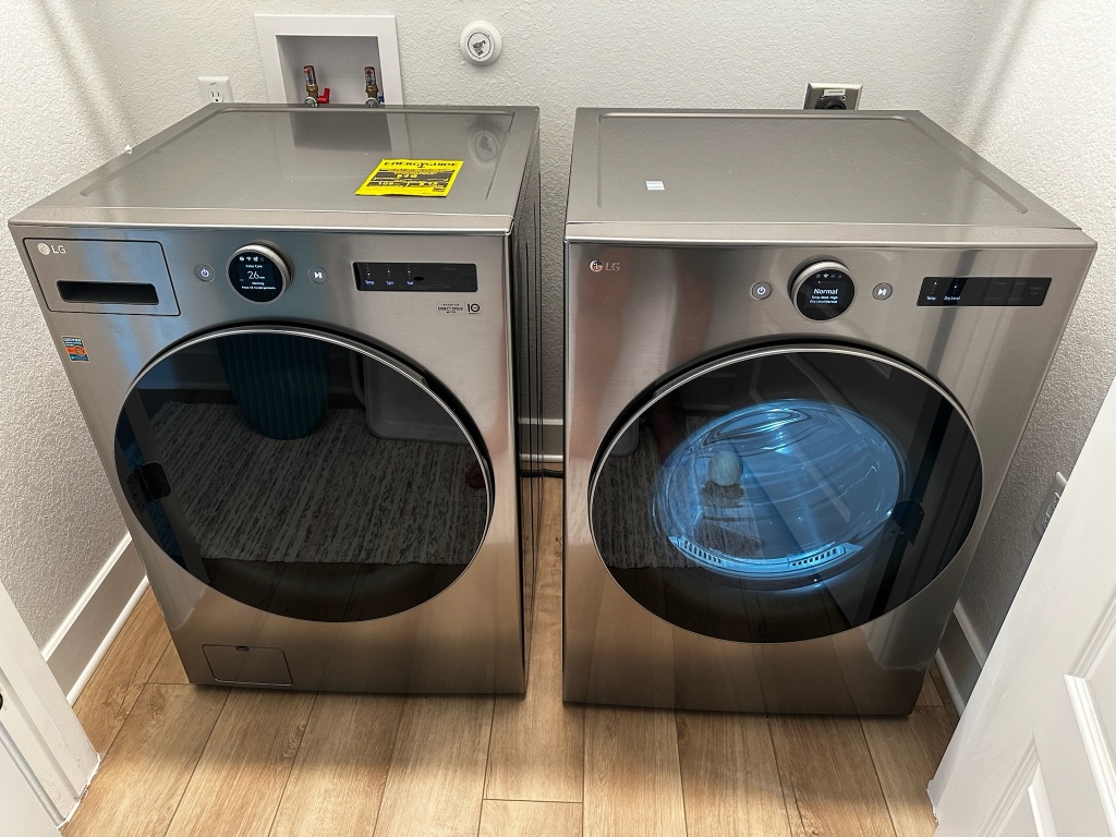 609 Terrier Trail Austin, TX 78745 - Photo 14 of 26 a utility room with dryer and washer
