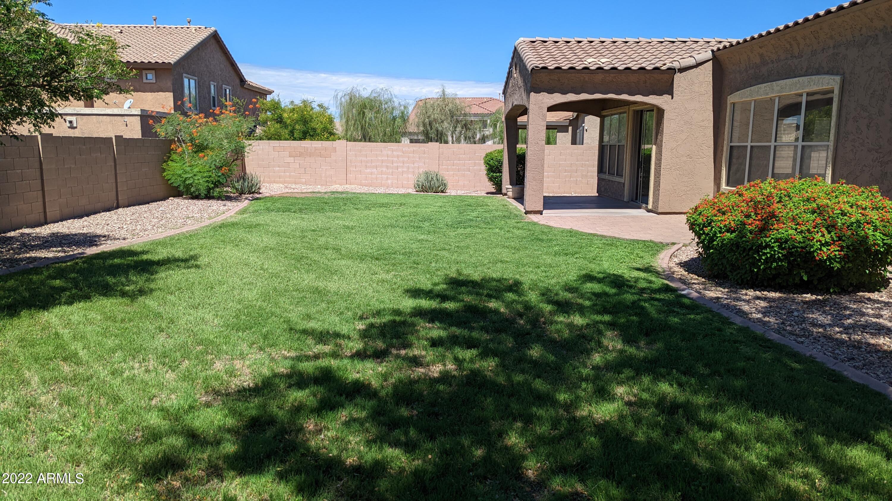 2233 West Apache Rain Road Phoenix, AZ 85085 - Photo 36 of 41 Freshly mowed lawn!