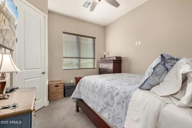 a view of a livingroom with workspace and a couch
