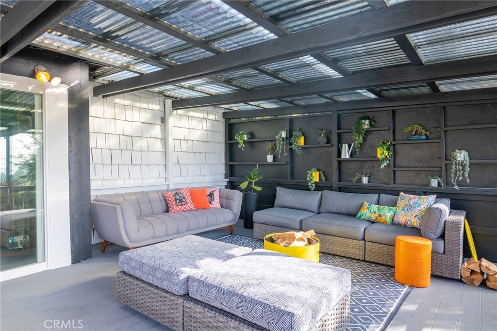 736 Griffith Place Laguna Beach, CA 92651 - Photo 9 of 24 a outdoor living space with furniture and a fireplace