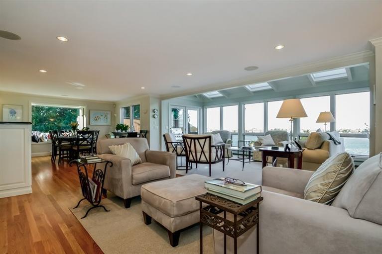 46 Gibson Road Orleans, MA 02653 - Photo 2 of 22 a living room with furniture and a large window