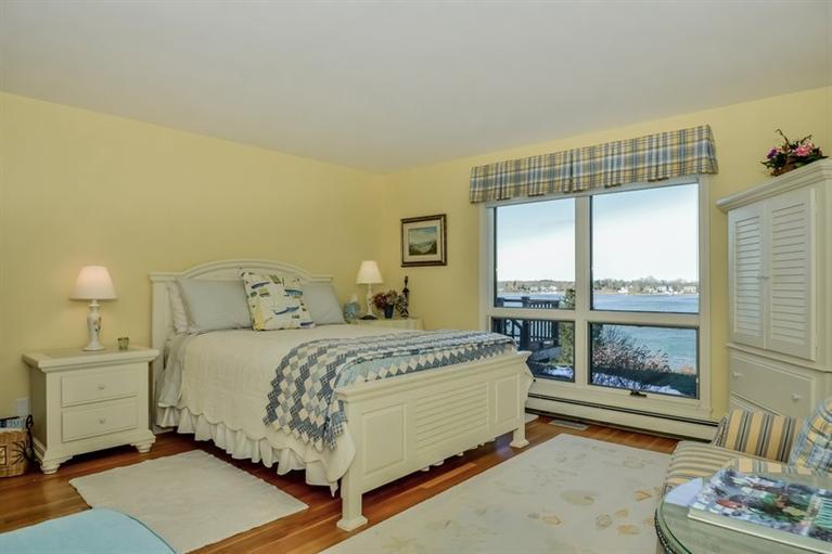 46 Gibson Road Orleans, MA 02653 - Photo 8 of 22 a bedroom with a bed and a window