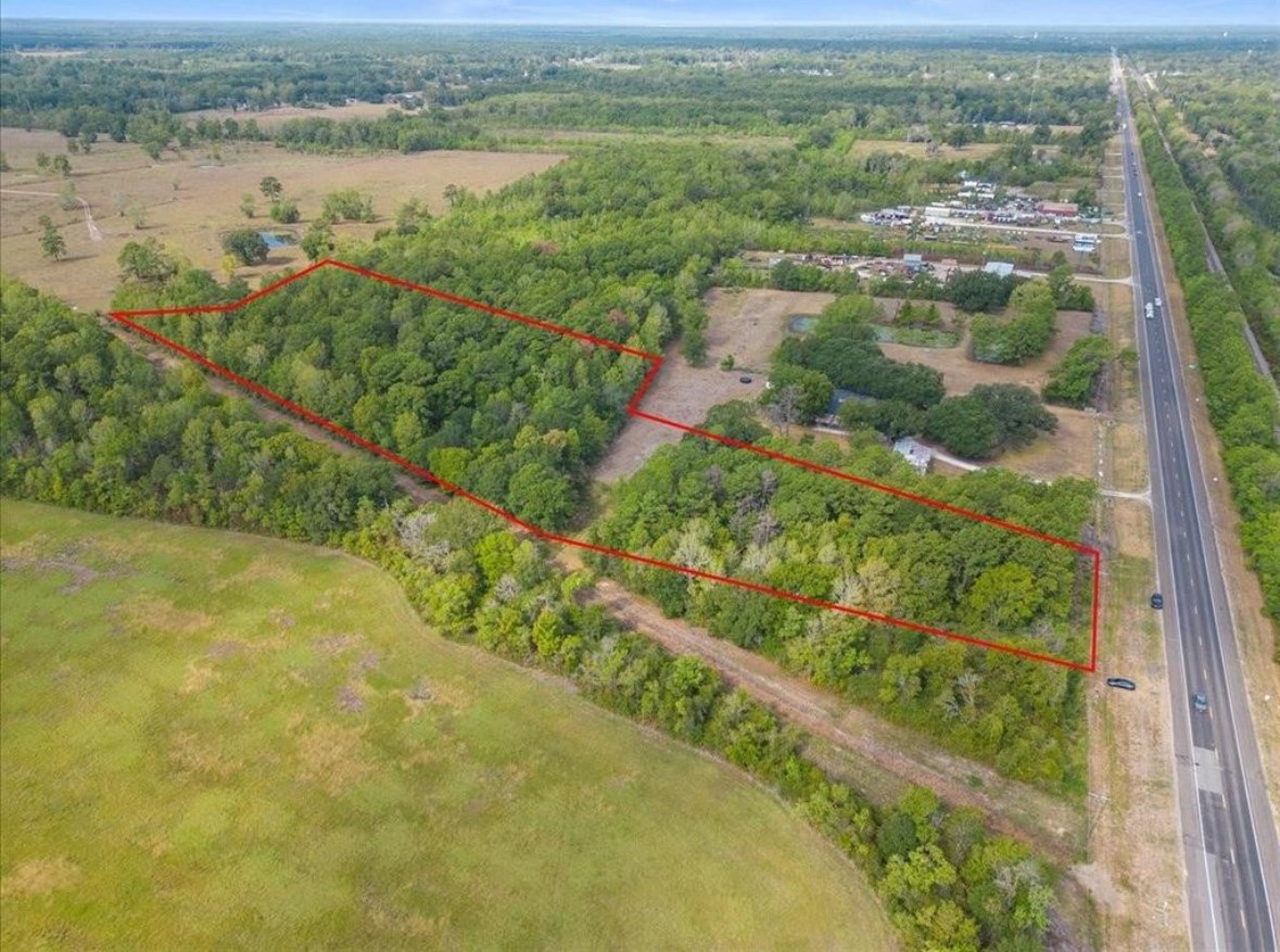 0 Us-90 Liberty, TX 77575 - Photo 3 of 7 a view of lake with green space