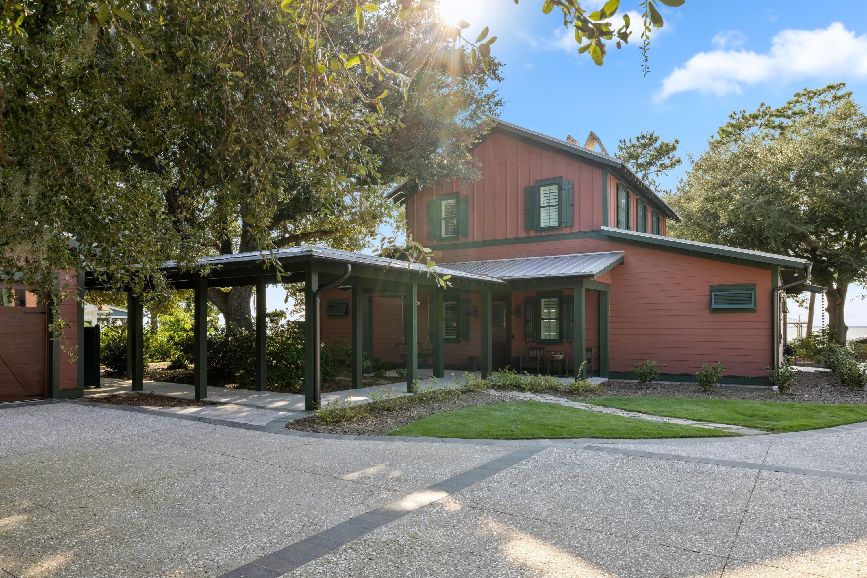 909 Butter Road Bonneau, SC 29431 - Photo 2 of 39 Covered Walkway into Home
