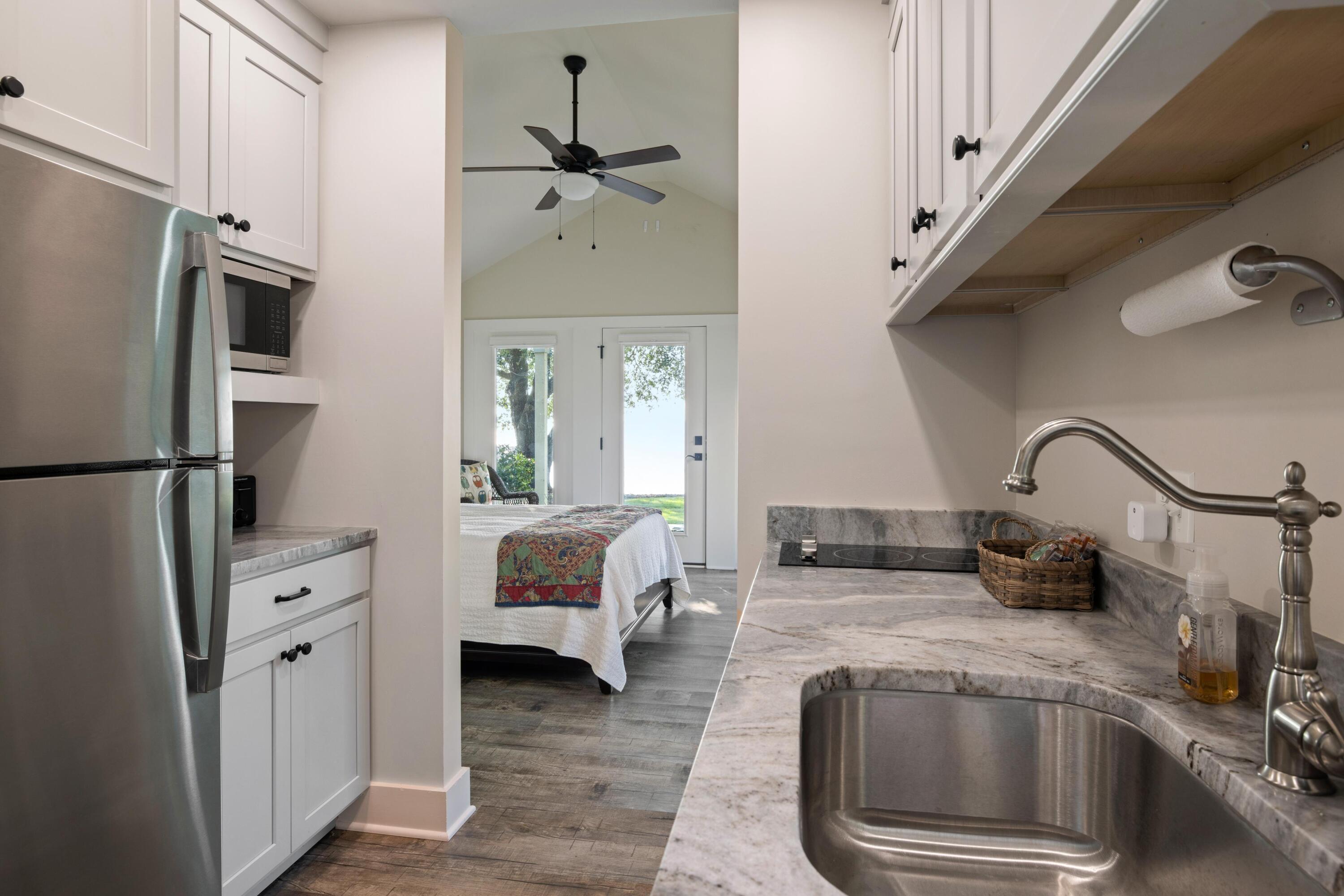 909 Butter Road Bonneau, SC 29431 - Photo 22 of 39 Bunkie Kitchen to Bedroom