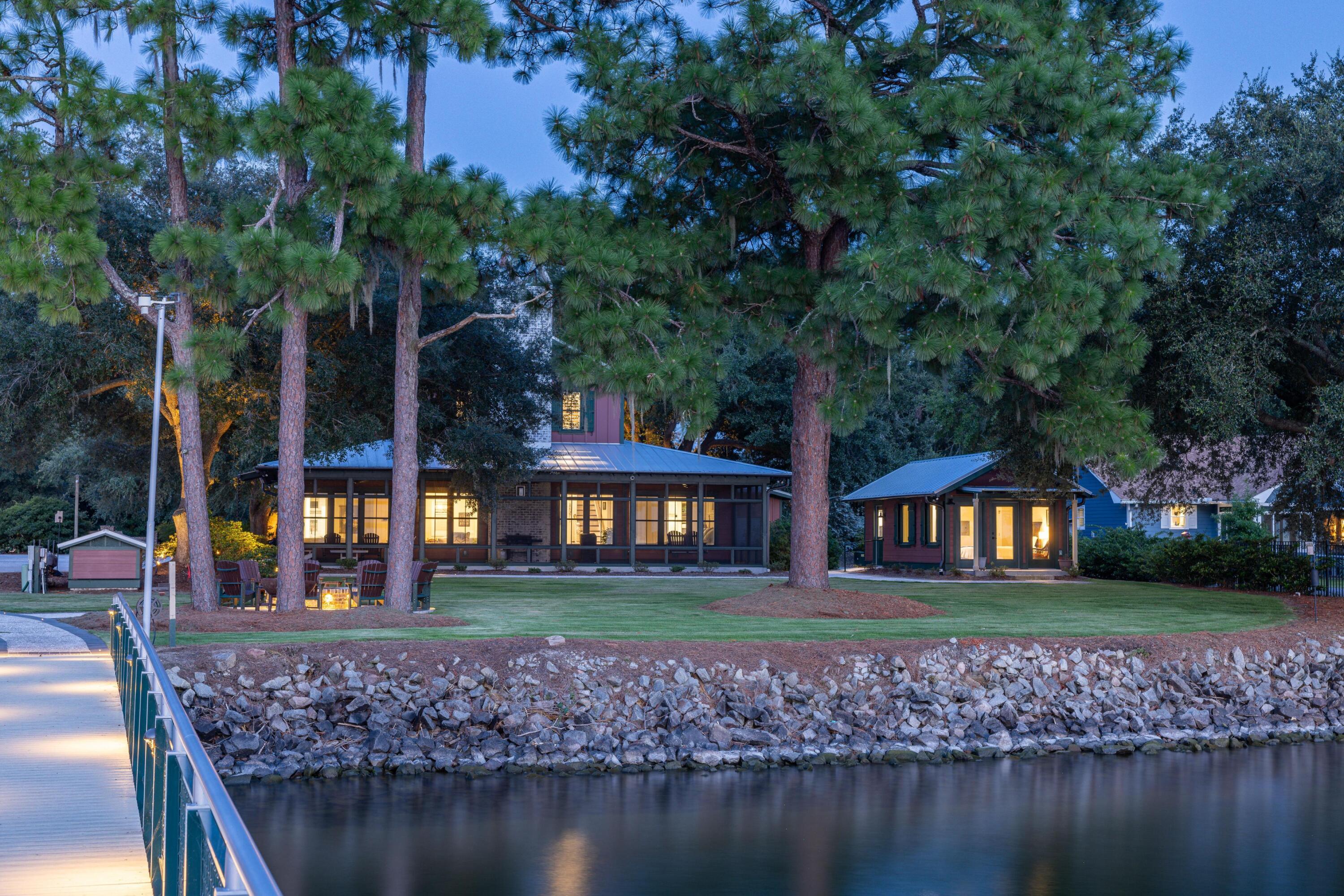 909 Butter Road Bonneau, SC 29431 - Photo 35 of 39 Primary Home and Bunkie at night