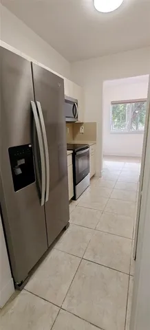 a view of a room with an empty space