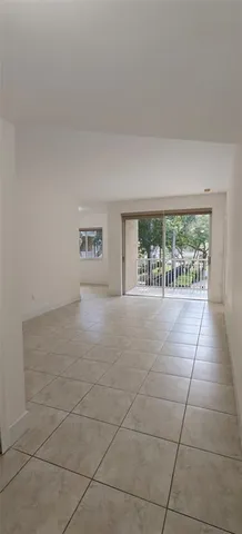a view of an empty room with garage