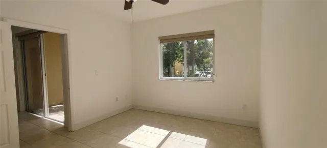 a view of empty room with windows
