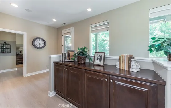 a kitchen with a sink and a large window