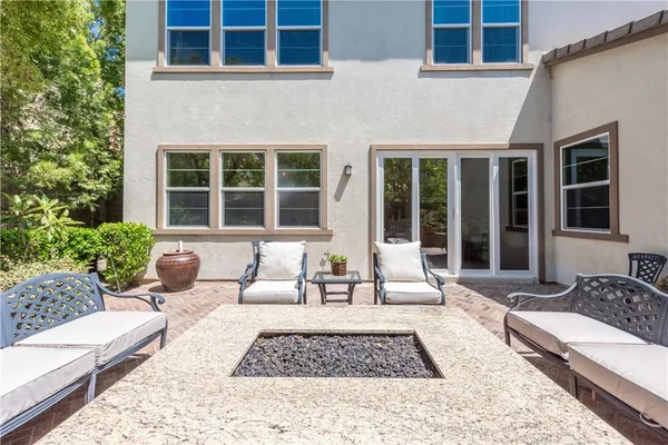a view of a brick building with large windows