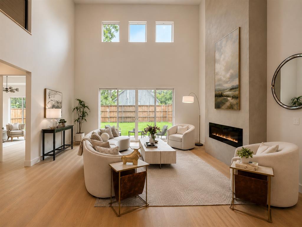 4322 Sexton Lane Dallas, TX 75229 - Photo 3 of 37 Natural light in your 2-story living room and private backyard.