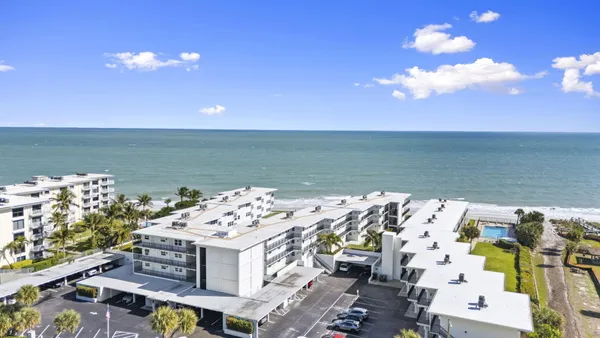 a view of a terrace with a lake view