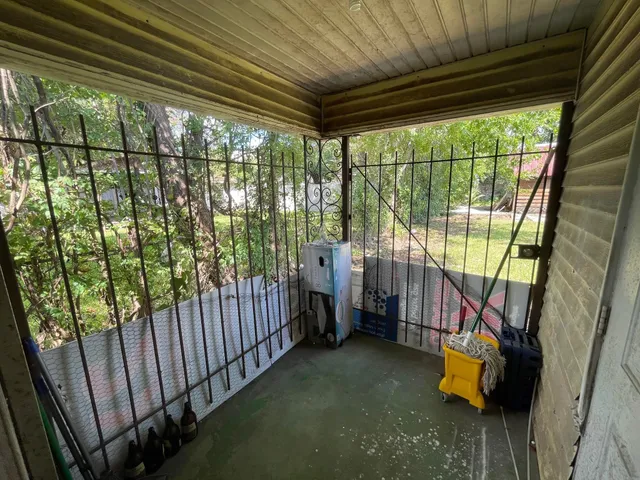 a view of porch and garden